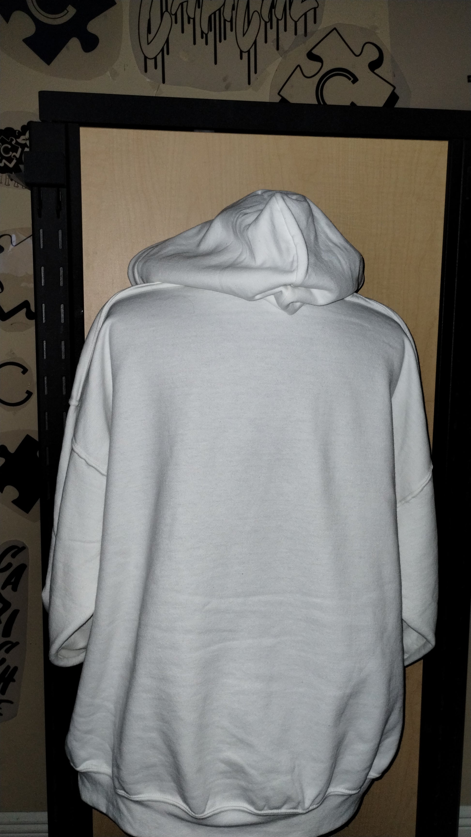 Back of white hoodie on a manikin