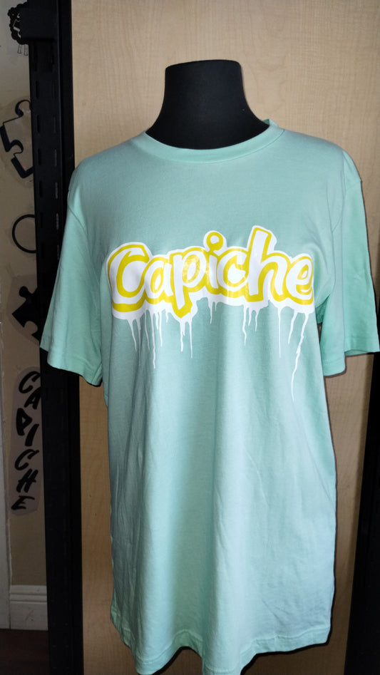 Mint Colored TShirt on a manikin. Capiche logo printed on the front in banana yellow and white ink.